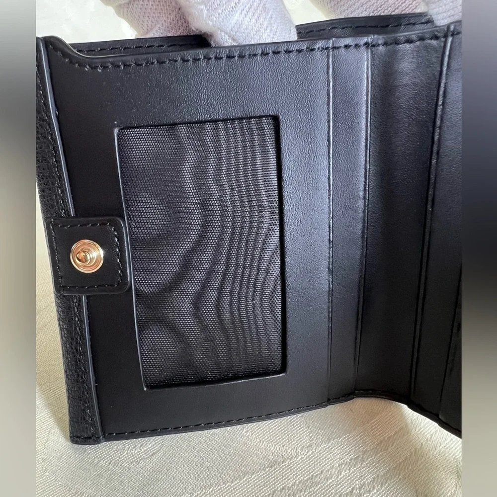 1017: Furla Black Pebbled Leather Compact Bifold Wallet